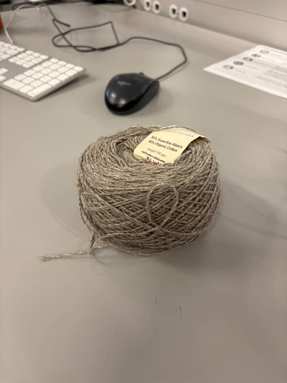 Twine<br>Material state: refined (processed from fibres twisted into twine)<br>Colour: Brown and beige<br>Rigidity: Low<br>Surface texture: Rough-ish yet soft and playable<br>Material use: Tool, used as rope or decoratively