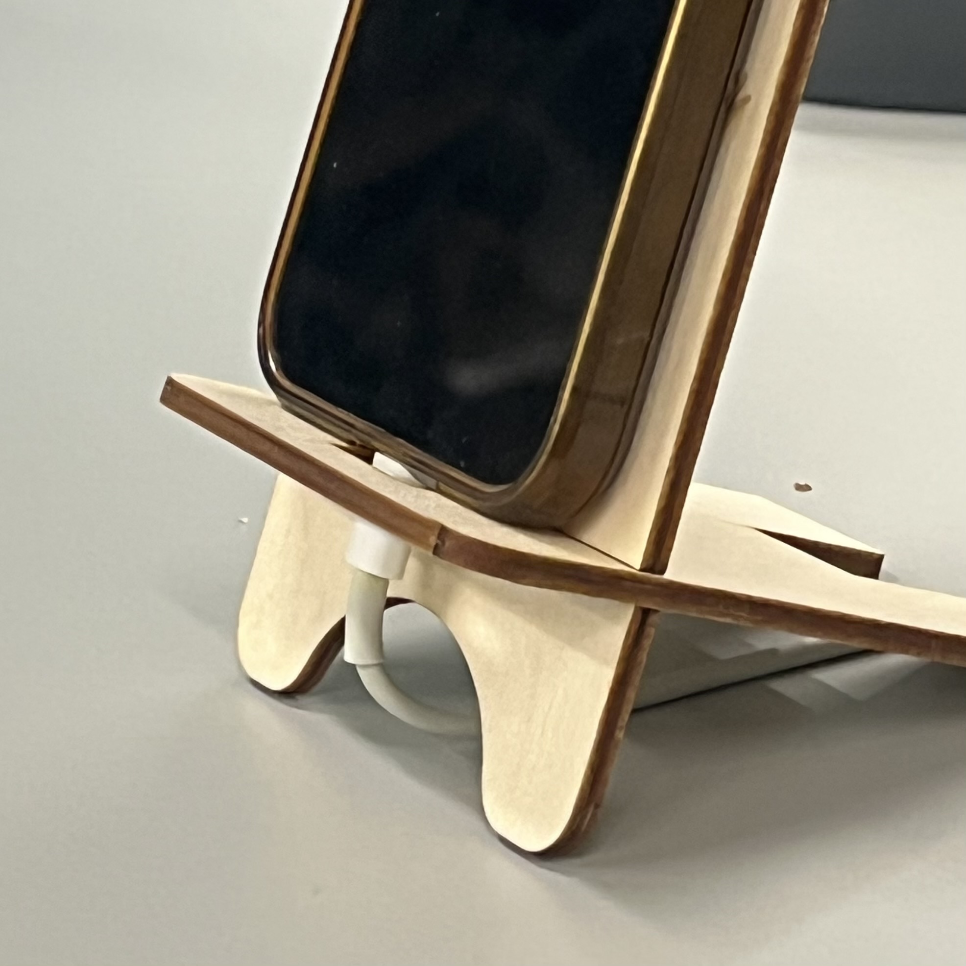 Final phone stand with charging cable